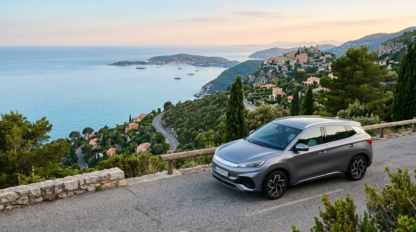 Grey electric SUV parked at a French Riviera coastal viewpoint